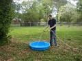 Kevin filling the pool